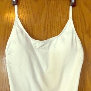 One piece white swim suit with silver star rivets